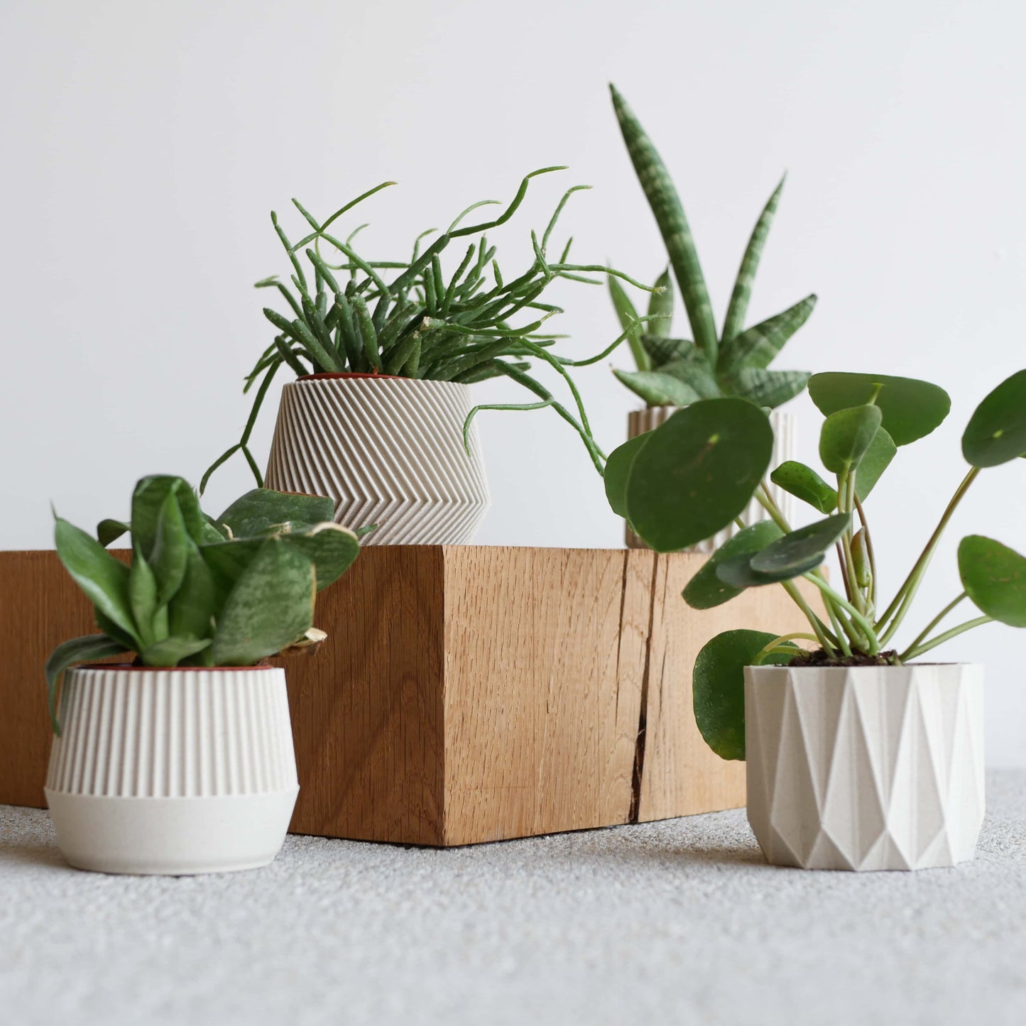 Set van 4 witte plantenpotten – Oslo Origami Kobe Stockholm
