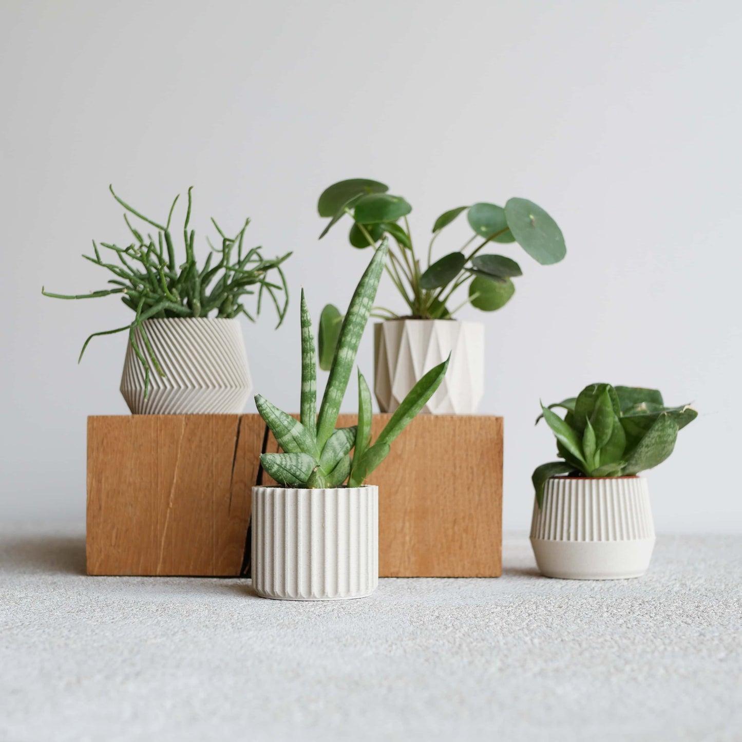 Set van 4 witte plantenpotten – Oslo Origami Kobe Stockholm